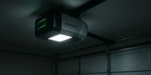 Belt-drive garage door opener showing integrated battery backup during Seattle rainstorm